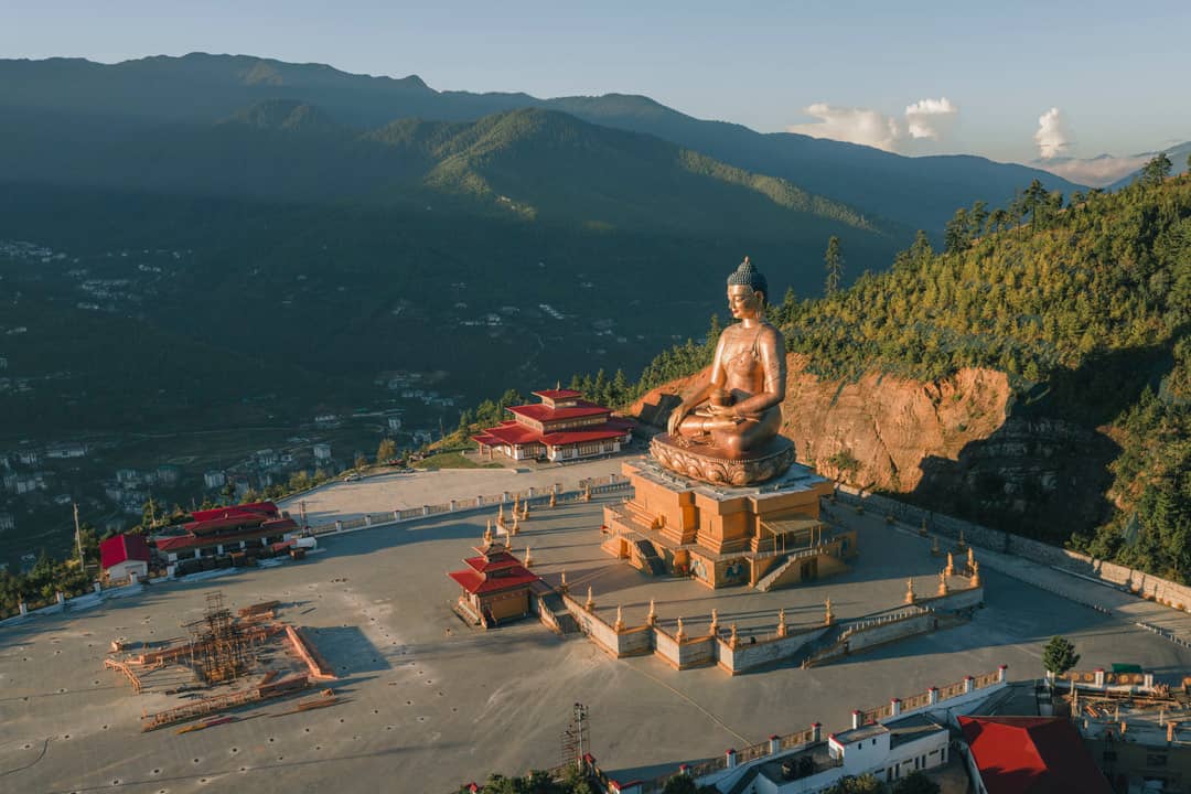 Buddha Dordenma overlooking the forested hills above Thimphu
