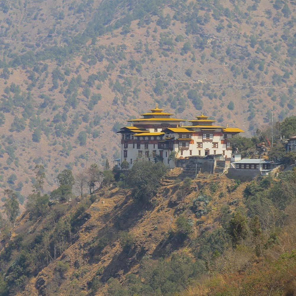 Trashigang Dzong standing against the dry hills of eastern Bhutan