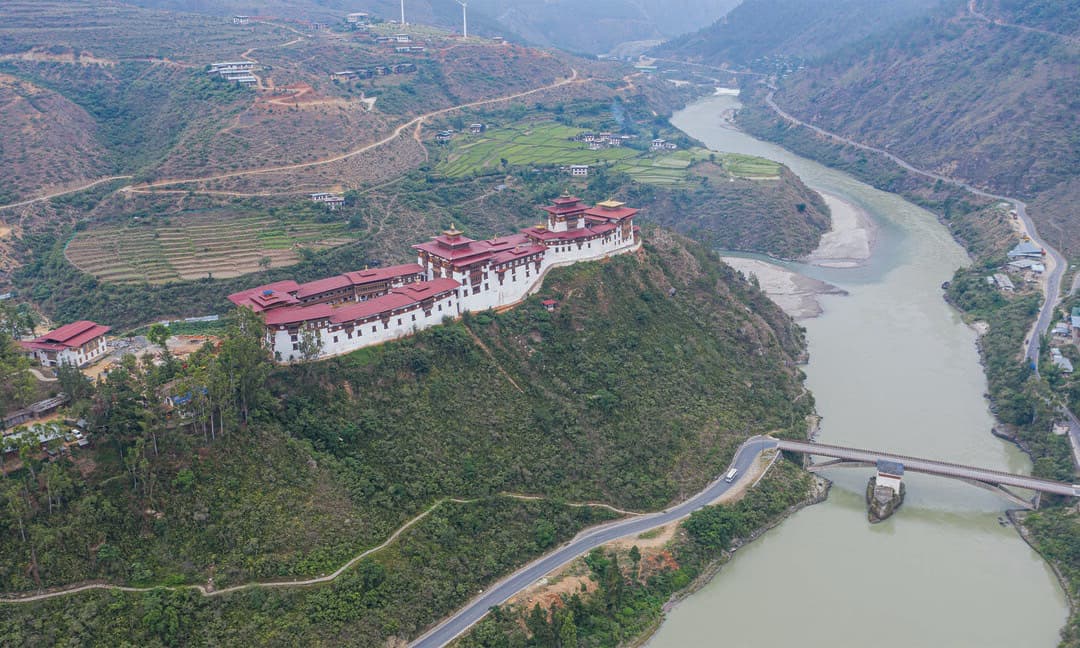 Wangdue Dzong overlooking the river confluence and cultivated hills