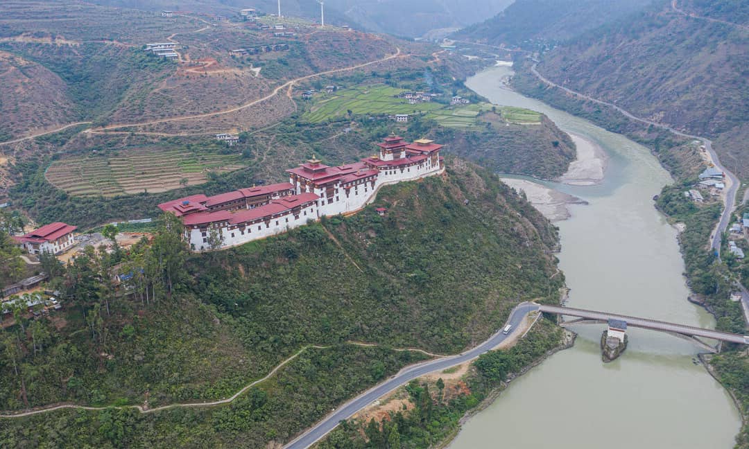 Wangdue Dzong overlooking the river confluence and cultivated hills